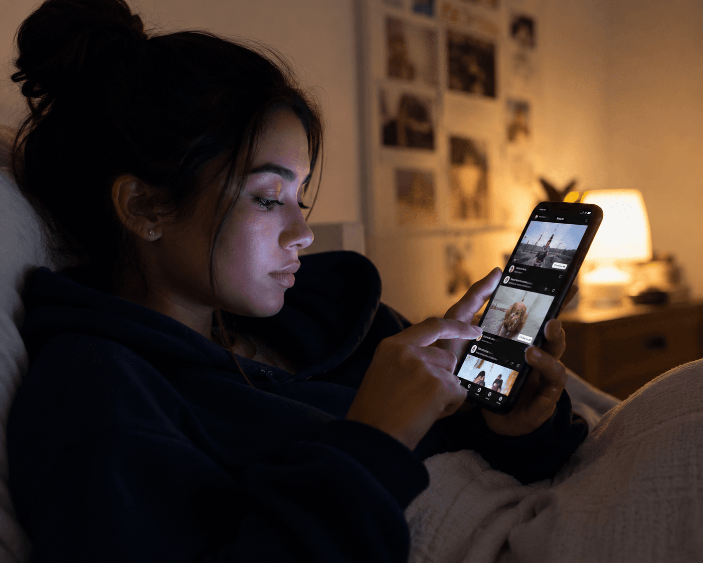 Teenager scrolling social media on a smartphone