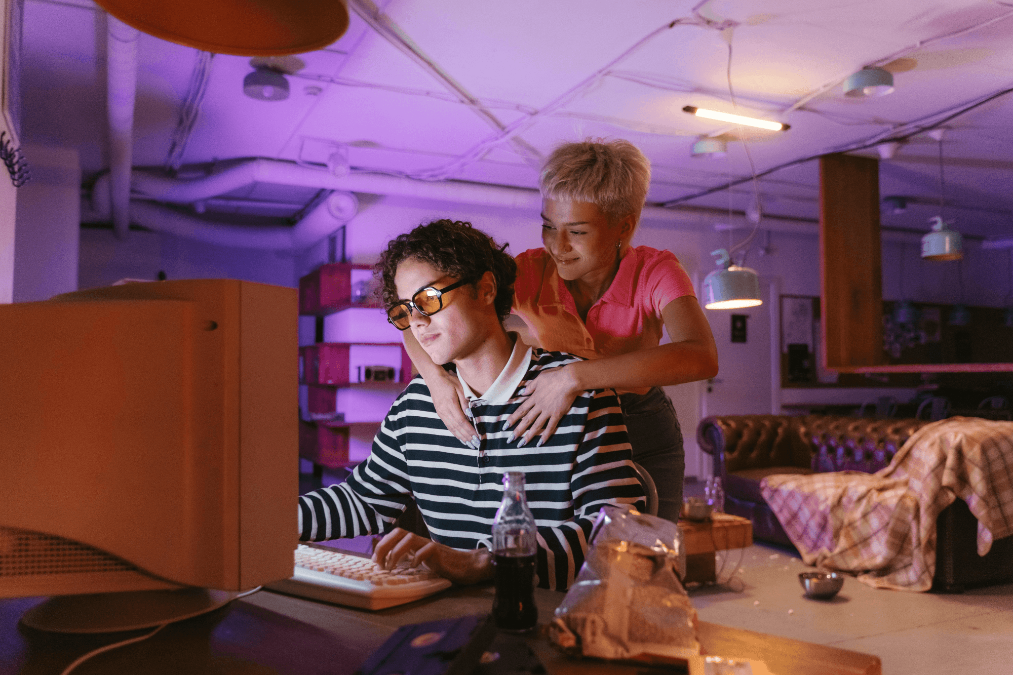 People reviewing information on a computer